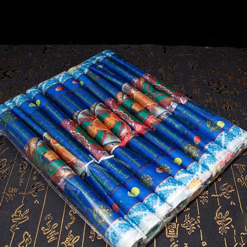Tibetan prayer flag with Buddhist imagery and traditional hand-block printing from Nepal artisan craftspeople