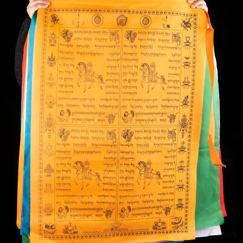 Hand-held Tibetan prayer flag displaying orange fabric with black printed wind horse design and traditional five-color sacred borders