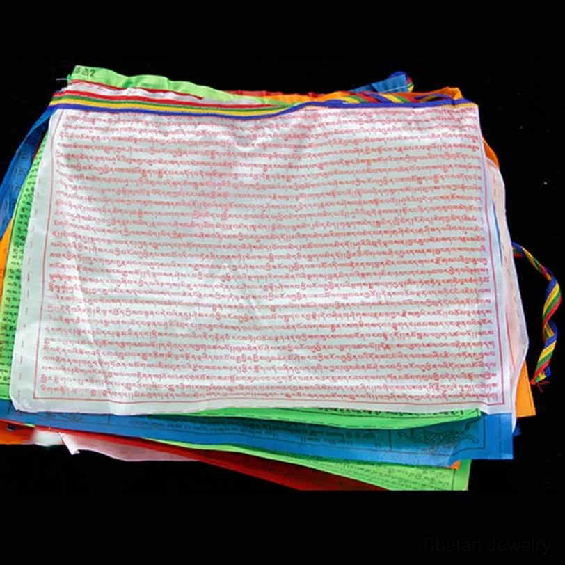 Tibetan prayer flag set packaging contents showing complete 20 flags with hanging hardware and instruction guide