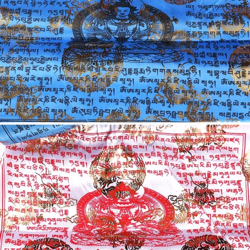 Two tibetan prayer flag closeup samples showing blue buddha flag and red buddha flag with intricate printed designs and gold accents