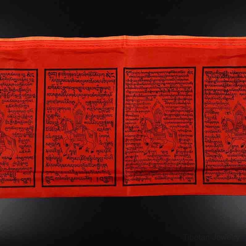 Tibetan prayer flags red fire element flag with compassion transformation symbols and prayers