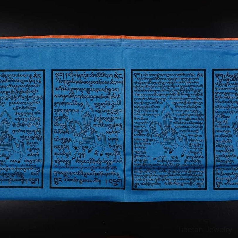 Tibetan prayer flags hand-printed wooden block craftsmanship showing traditional artisan technique