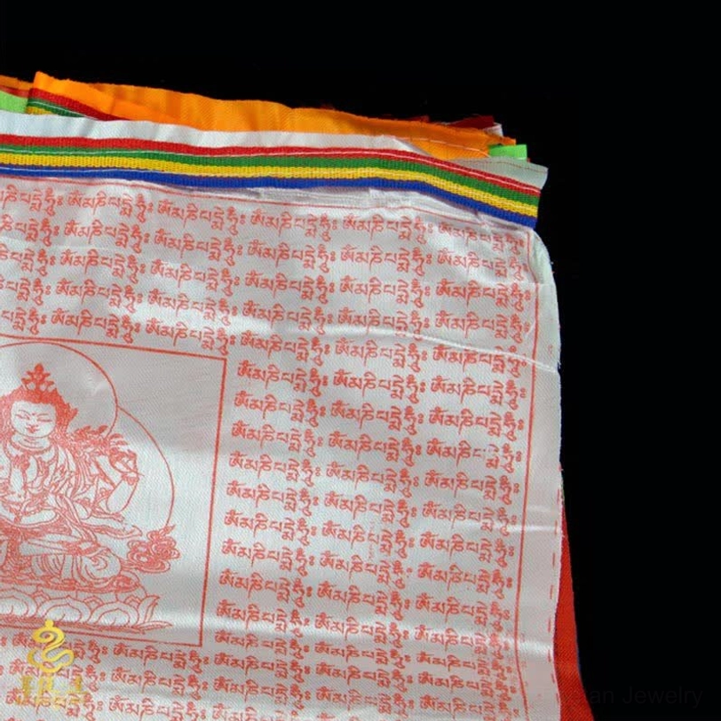 Hand-printed Tibetan prayer flags showing artisan craftsmanship wooden block printing method from Nepal
