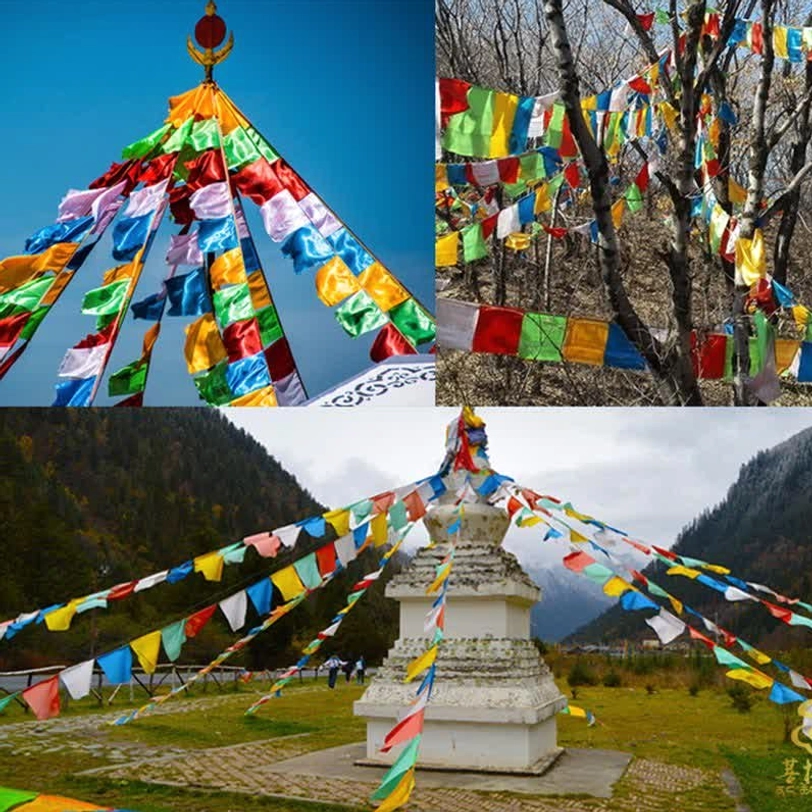 Tibetan prayer flag strings displayed in natural outdoor mountain landscape with forest and stupa spiritual setting