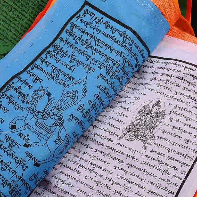 Tibetan windhorse prayer flags green water element flag showing healing growth symbols detail