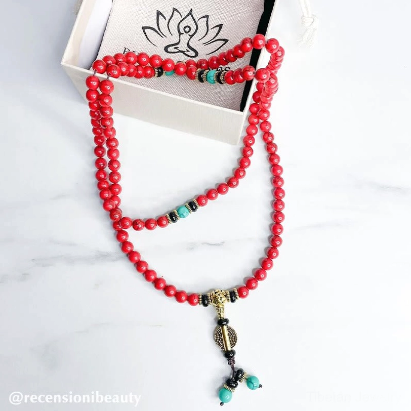 Authentic Tibetan prayer mala beads with red turquoise stones and bronze decorative accents spiritual tool