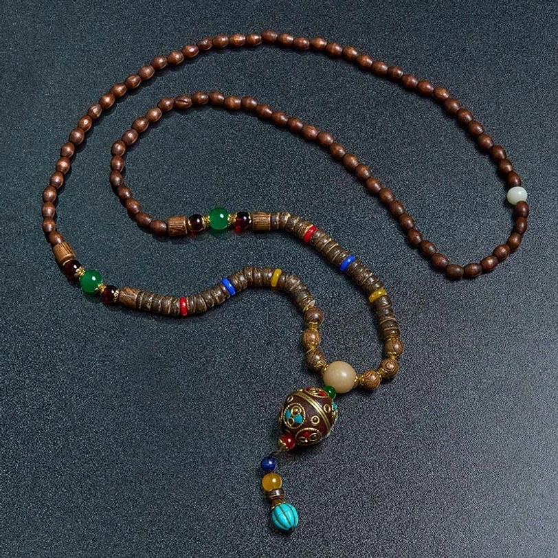 Tibetan Buddhist prayer necklace with alternate enamel pendant design, wooden beads, and colorful tassel charms