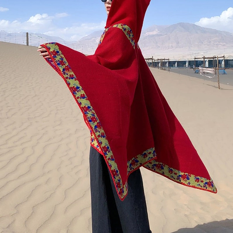 Tibetan hooded prayer shawl worn during spiritual practice or meditation retreat setting