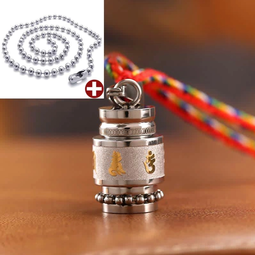 Tibetan prayer wheel amulet pendant showcasing Sanskrit mantra engraving and titanium steel material