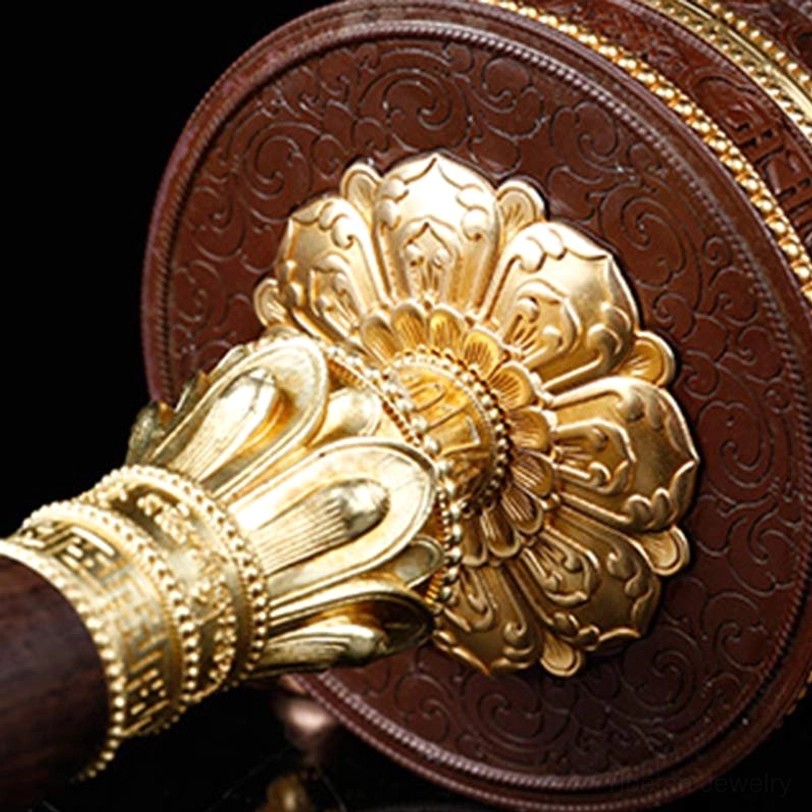 Prayer wheel back end face with large gold lotus ornament