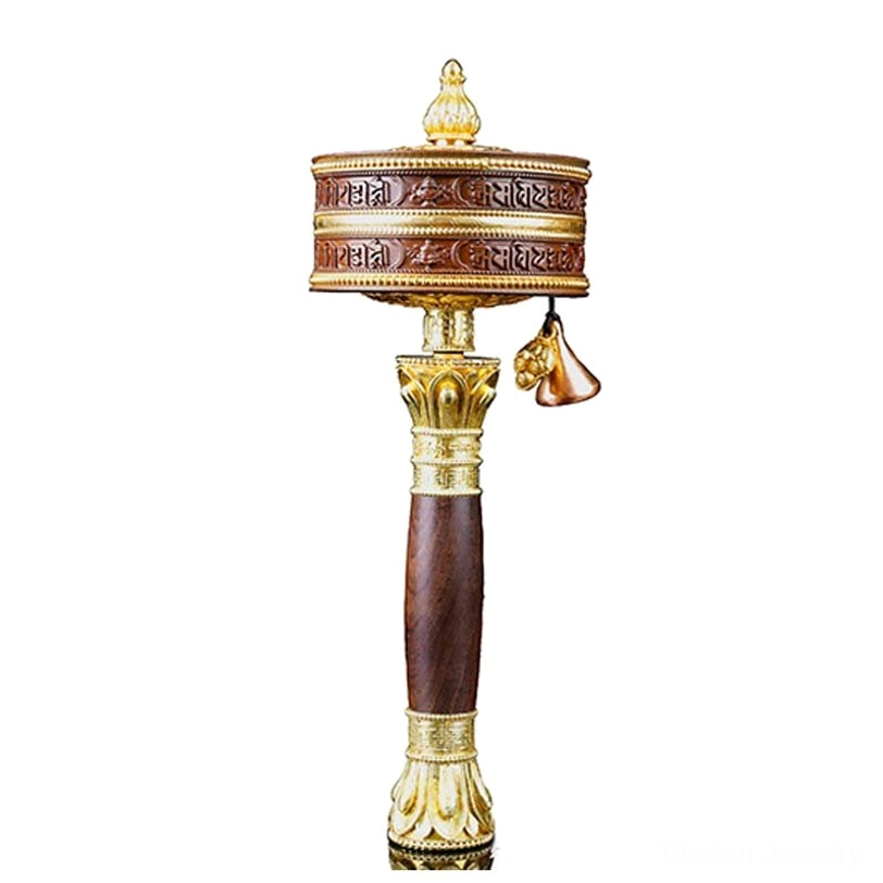 Tibetan prayer wheel in meditation space showing spiritual practice use