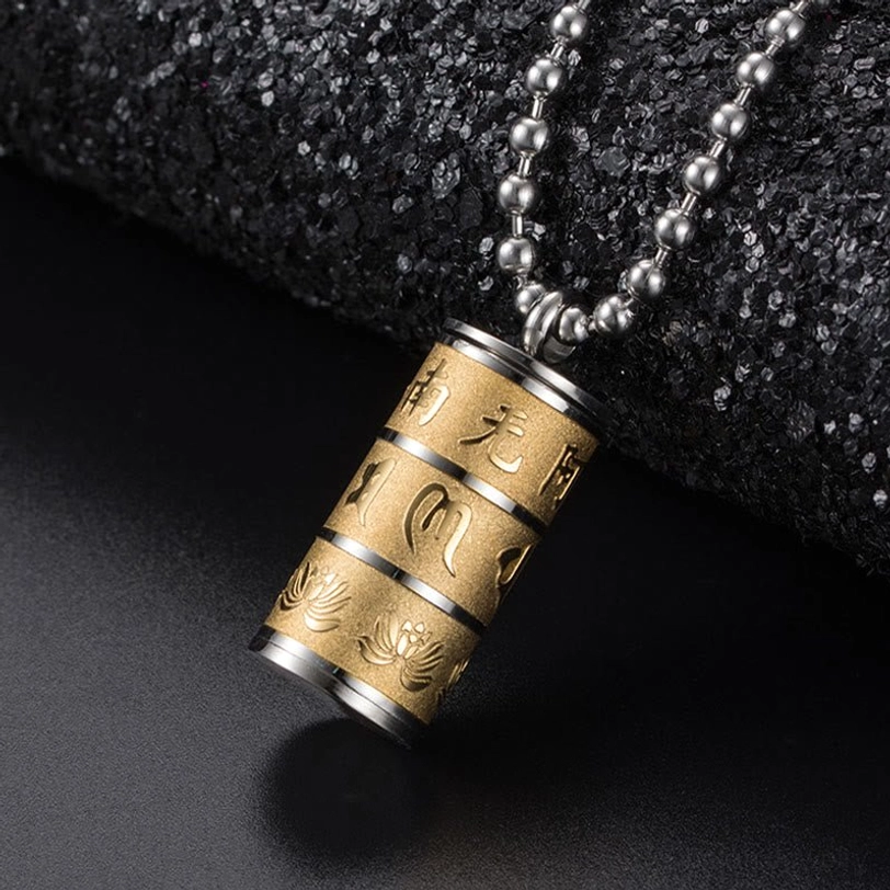Om Mani Padme Hum titanium steel prayer wheel pendant necklace in dual-tone gold and silver with engraved lotus pattern