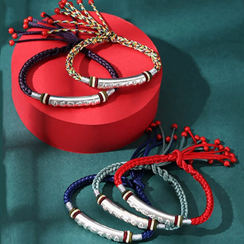 Blue Tibetan protection bracelet with 999 sterling silver and sacred mantra engraving