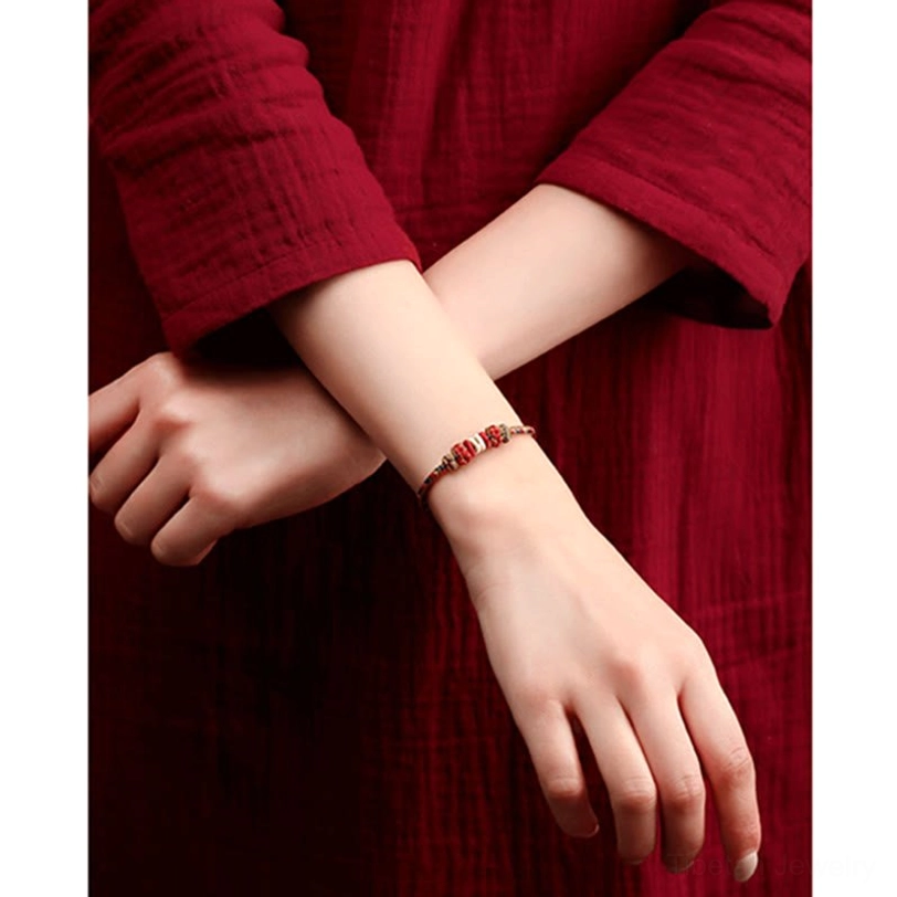 Blessed Tibetan protection bracelet worn as daily accessory with lifestyle background