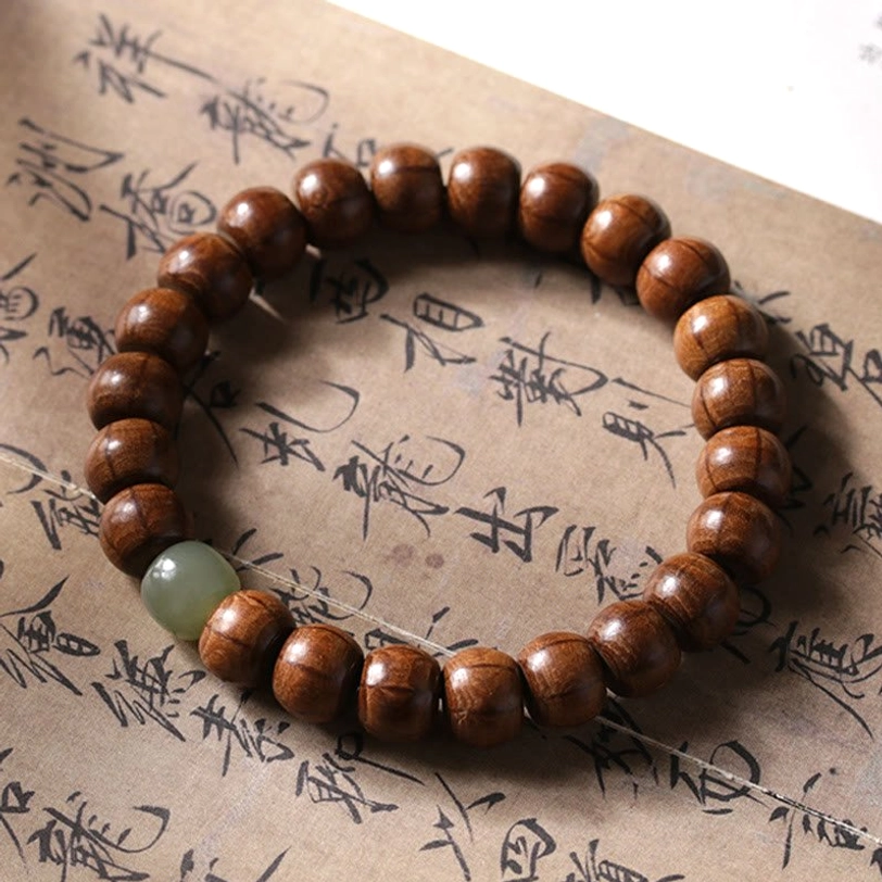Tibetan Abelia Biflora wood and Hetian jade bracelet with 8x10mm barrel beads and jade spacer