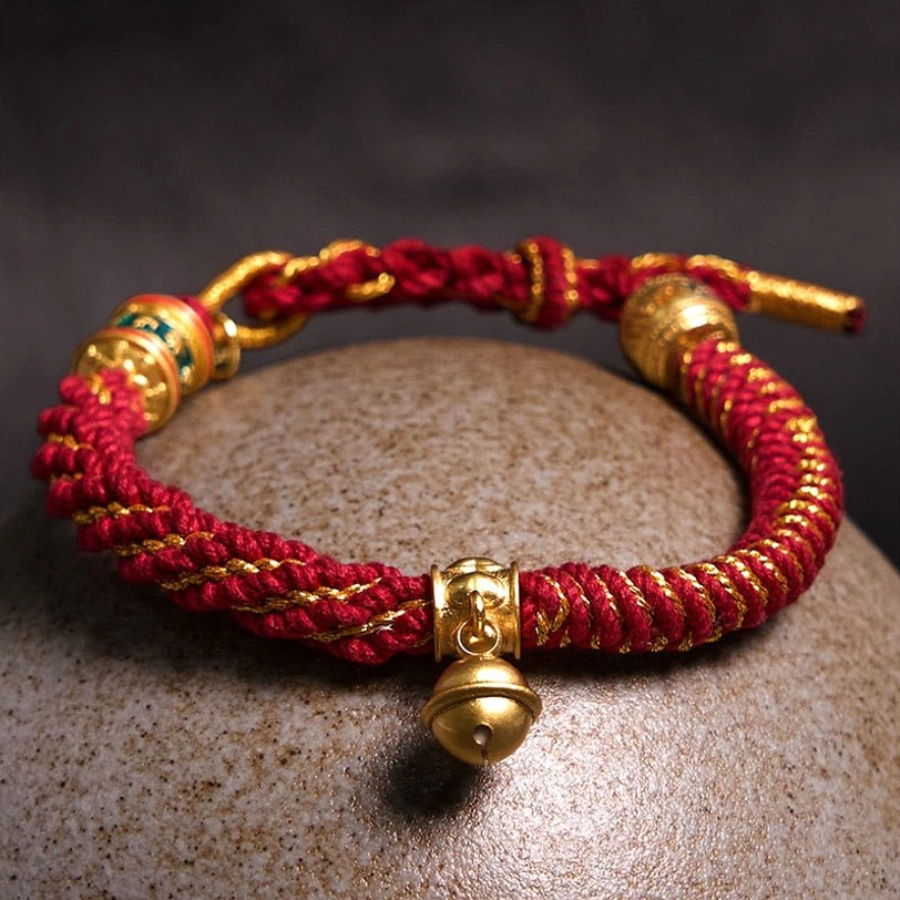Traditional Tibetan amulet bracelet with woven multicolor rope and protective charm beads for spiritual practice