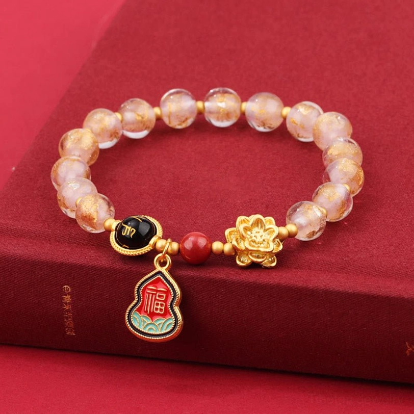 Purple Liuli glass Tibetan spiritual bracelet with spotted beads and sacred charm pendants for meditation and wellness