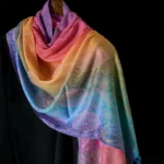 Tibetan rainbow paisley gradient tassel shawl front view - vibrant handwoven bohemian wrap with multi-color jacquard pattern
