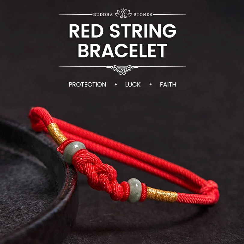 Tibetan red string jade lucky knot bracelet with braided cord and jade beads close-up view