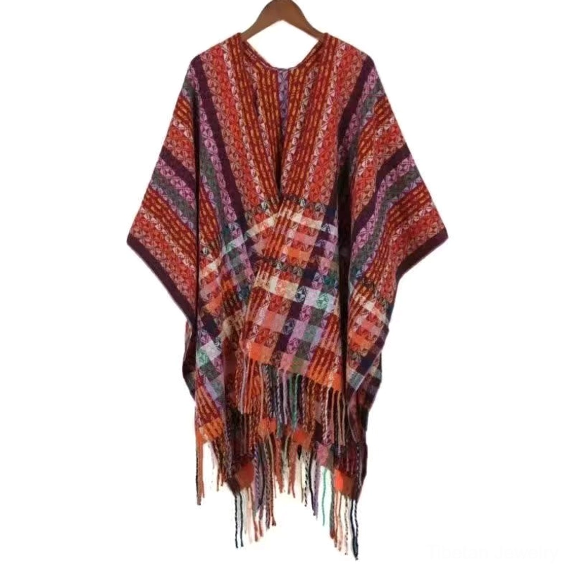 Tibetan striped tassel shawl in vibrant red color variation showing geometric pattern and fringe hem detail