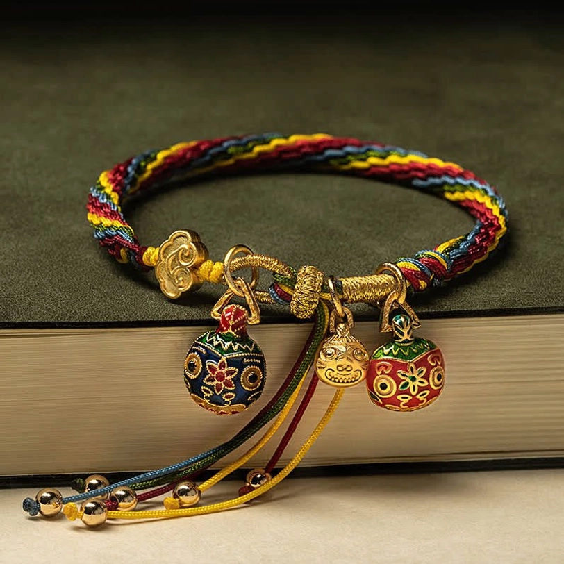 Tibetan reincarnation knot endless knot bracelet with protective red string and prosperity symbols