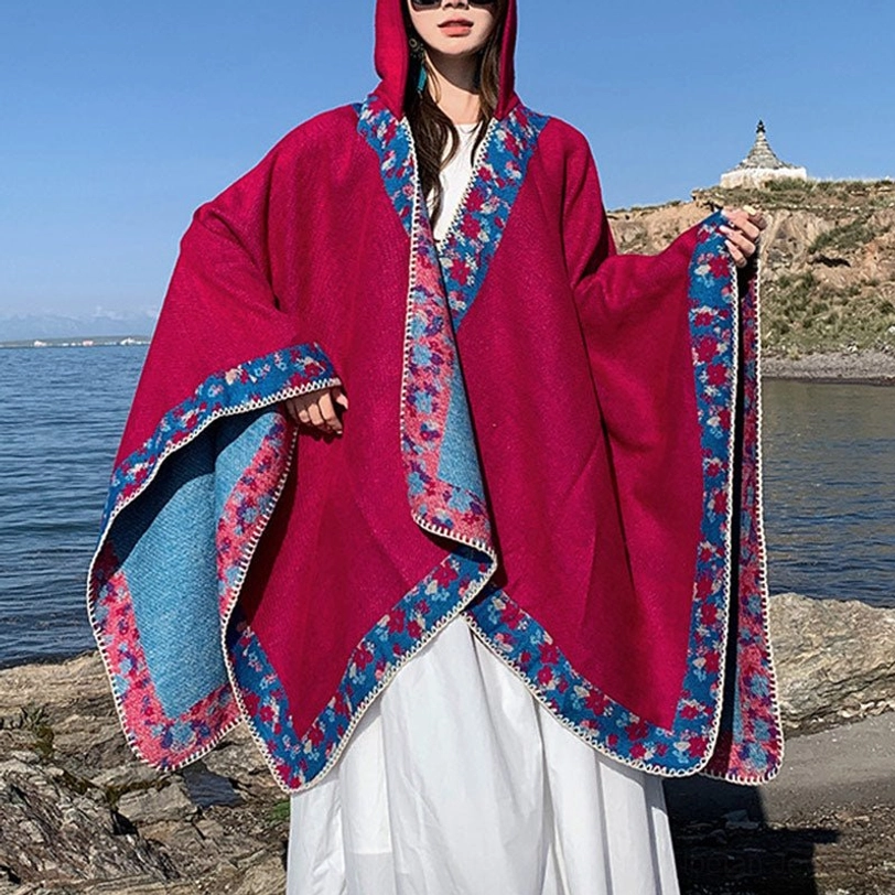 Rose red Tibetan reversible wrap showing color options and authentic cultural textile construction