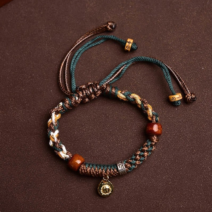 Two Tibetan rope bracelet styles side by side with braided cord designs, wooden beads, metal charms, and adjustable pull cords