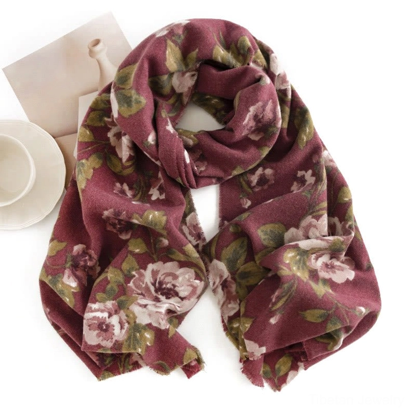 Burgundy Tibetan garden rose shawl draped flat lay showing intricate floral print detail and soft fabric drape