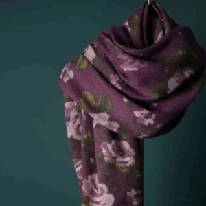 Tibetan garden rose shawl in deep burgundy with vintage floral print, front hanging view on studio background