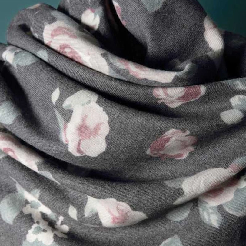 Burgundy Tibetan rose shawl styled flat lay with complementary vintage decor elements and fashion styling