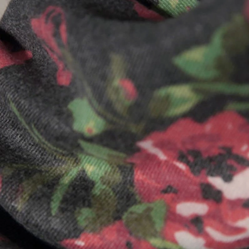 Tibetan cultural shawl with rose motifs representing compassion and mindful living traditions