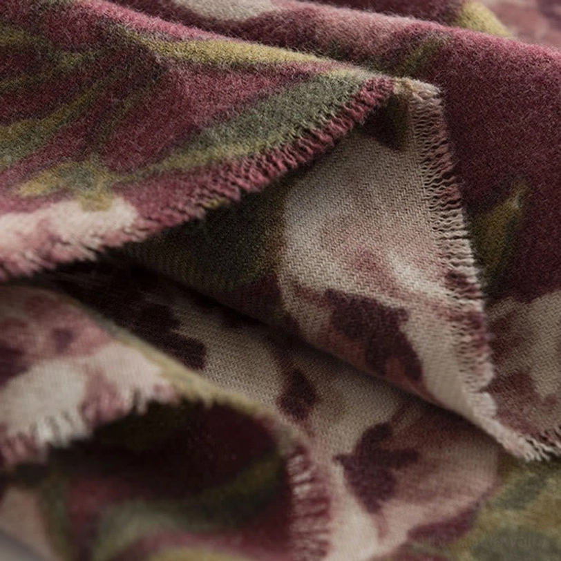 Tibetan garden rose shawl styled as evening wrap showing elegant draping and sophisticated floral pattern