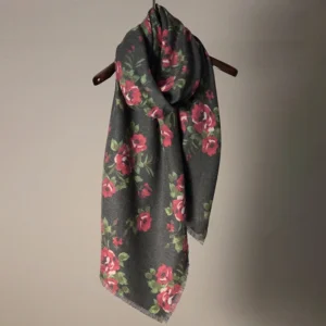 Tibetan rose floral printed shawl hanging on display, showing rich floral pattern and soft draped texture