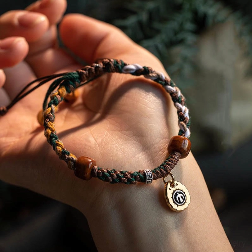 Tibetan protection rope bracelet with sacred symbolism and spiritual blessing energy