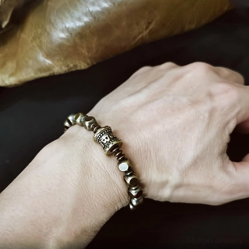 Tibetan sacred mantra bracelet highlighting hand-carved details and quality craftsmanship