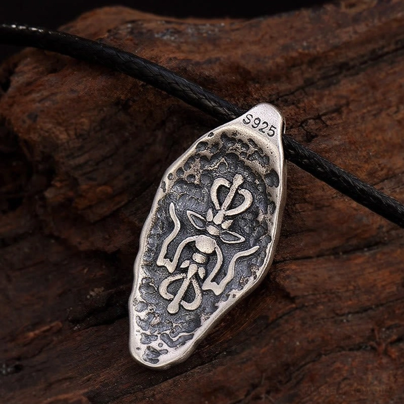 Tibetan necklace pendant featuring sacred mantra and Dorje symbol, sterling silver spiritual protection