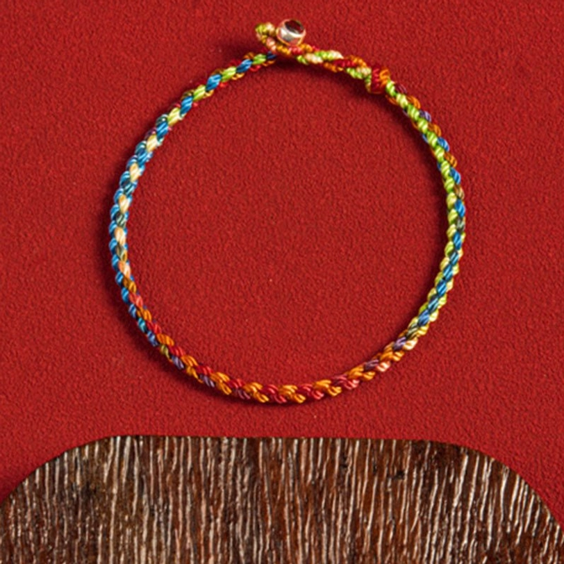 Sacred red string Tibetan bracelet showcasing spiritual protection and blessing energy