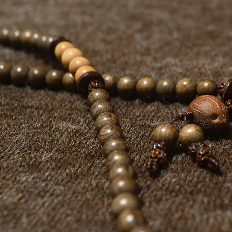 Tibetan sandalwood mala bracelet with 108 sacred beads for meditation and spiritual protection practice