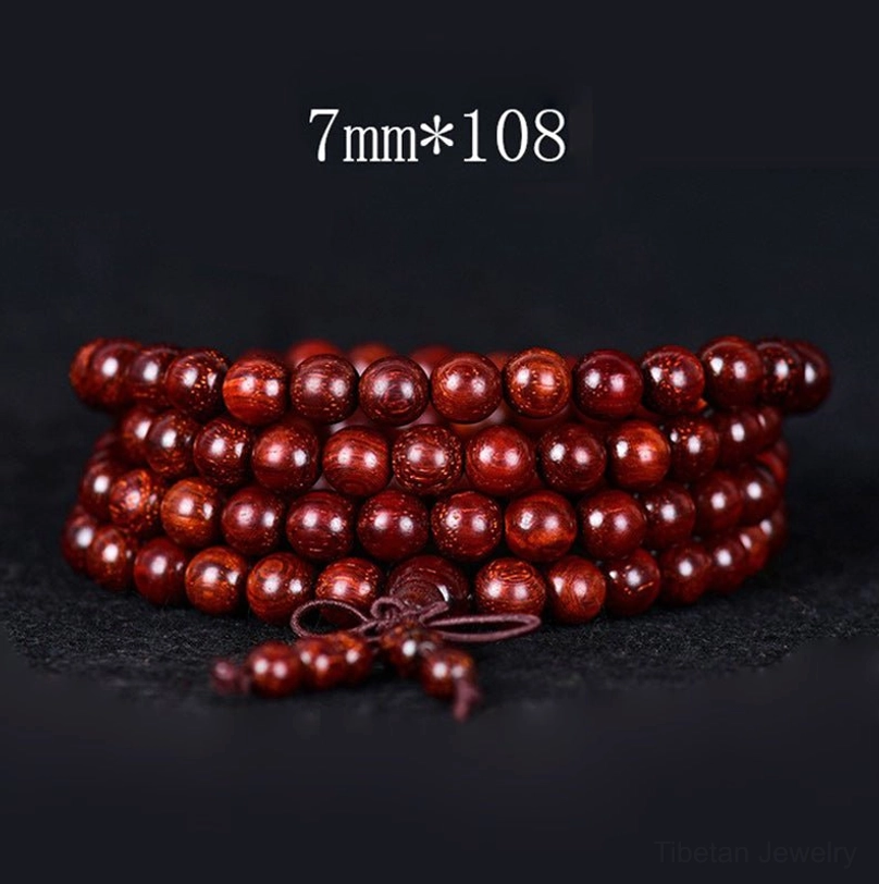 7mm bead Tibetan red sandalwood mala bracelet with 108 beads and brown silk tassel, overhead flat lay display