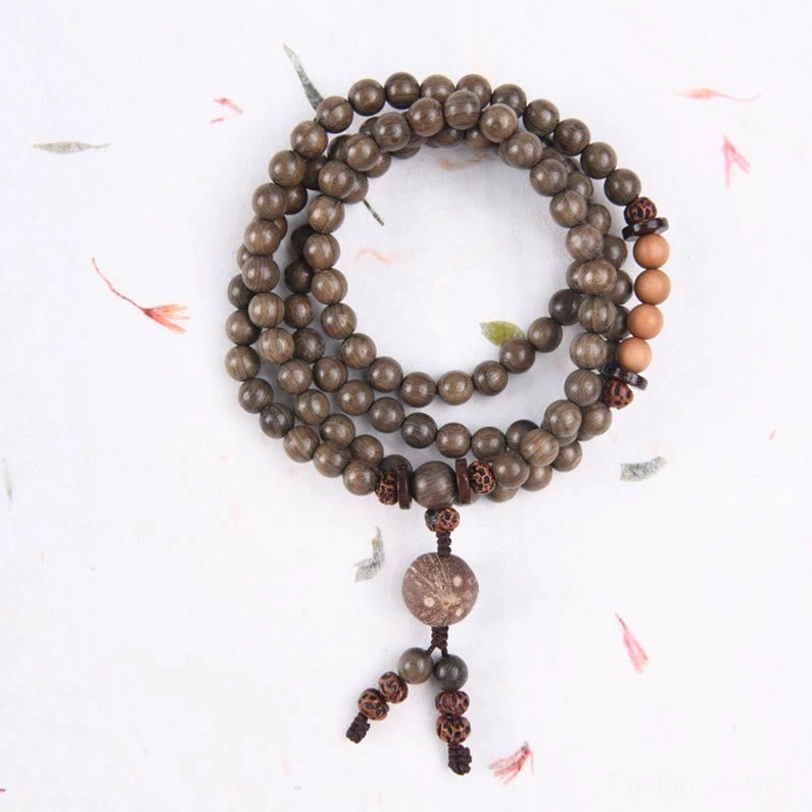 Small single-loop Tibetan sandalwood prayer bead mala with dark wooden beads, carved pendant and multi-part tassel