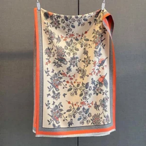 Tibetan printed scarf with red-blue floral motifs and orange-red grey border flat display