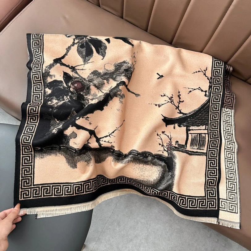 Black Tibetan ink scarf on mannequin, sophisticated monochrome design with geometric trim and classical pavilion motifs