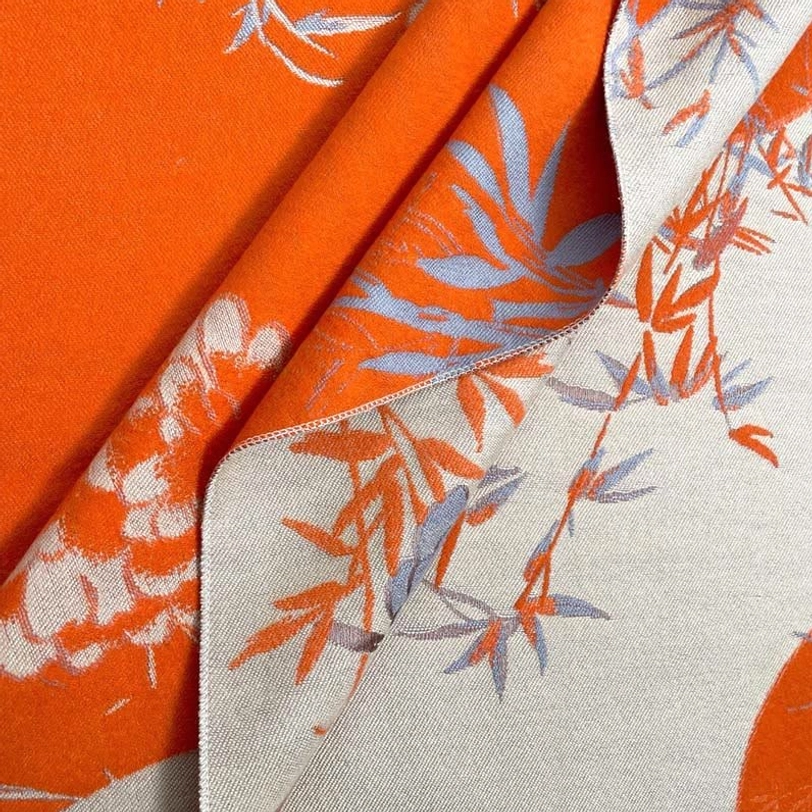 Tibetan reversible scarf collection showing multiple colorways coral red bisque with bamboo peony patterns