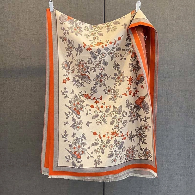 Dark orange Tibetan scarf shawl with colorful floral bird prints tassel trim lifestyle photo