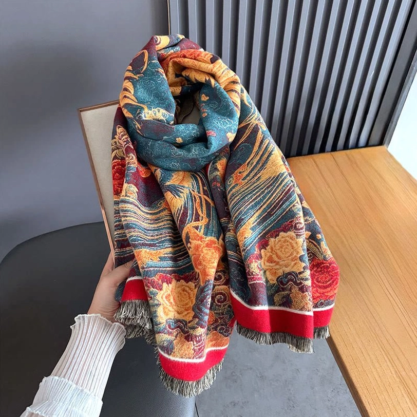 Tibetan peony phoenix scarf draped around neck showing warm tones and bird floral motifs in home setting