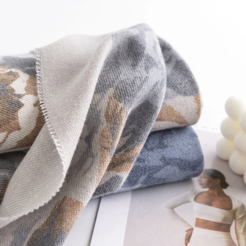 Premium Tibetan scarf wrap detail shot emphasizing fine weaving quality and soft comfortable fabric for all-season wear