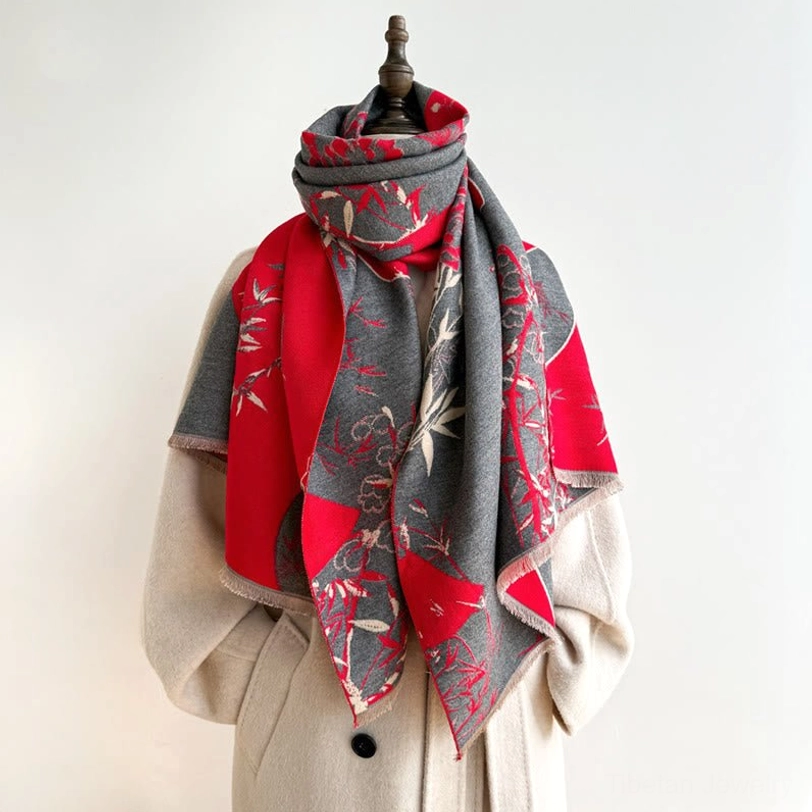 Red and grey Tibetan bamboo peony scarf worn with rolled neck styling showing soft draped fit