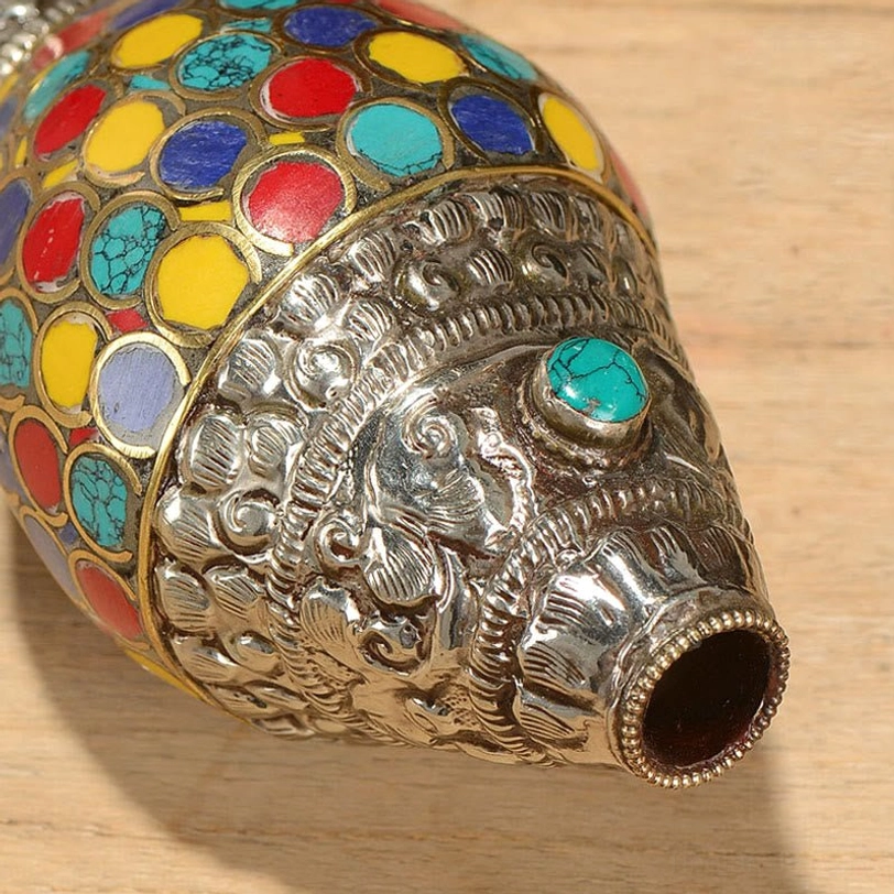 Authentic Tibetan shankha conch shell with natural materials and traditional Buddhist craftsmanship