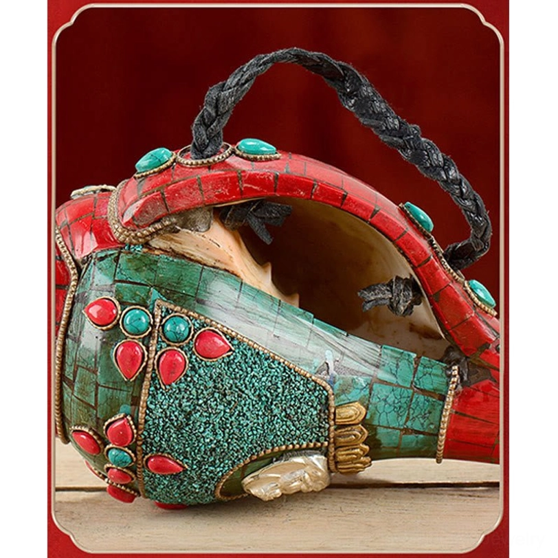Tibetan Shankha conch with black woven rope strap and exposed inner cavity with gemstone decorations