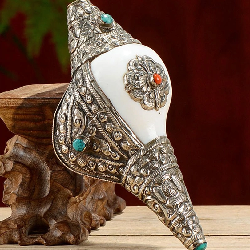 Tibetan shankha conch shell spiritual prosperity decoration with protective silver wrapping and gemstone embellishment